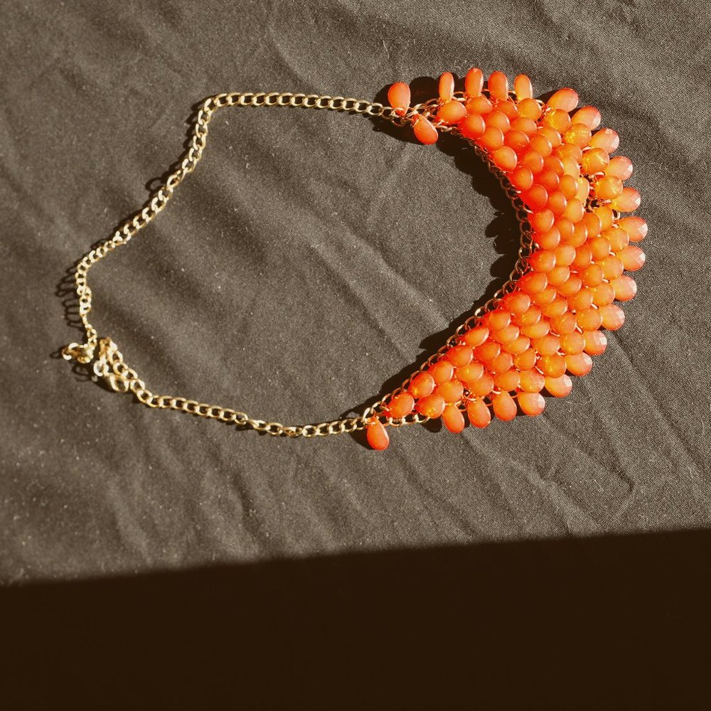 Pinky orange coral color jewel necklace gold metal